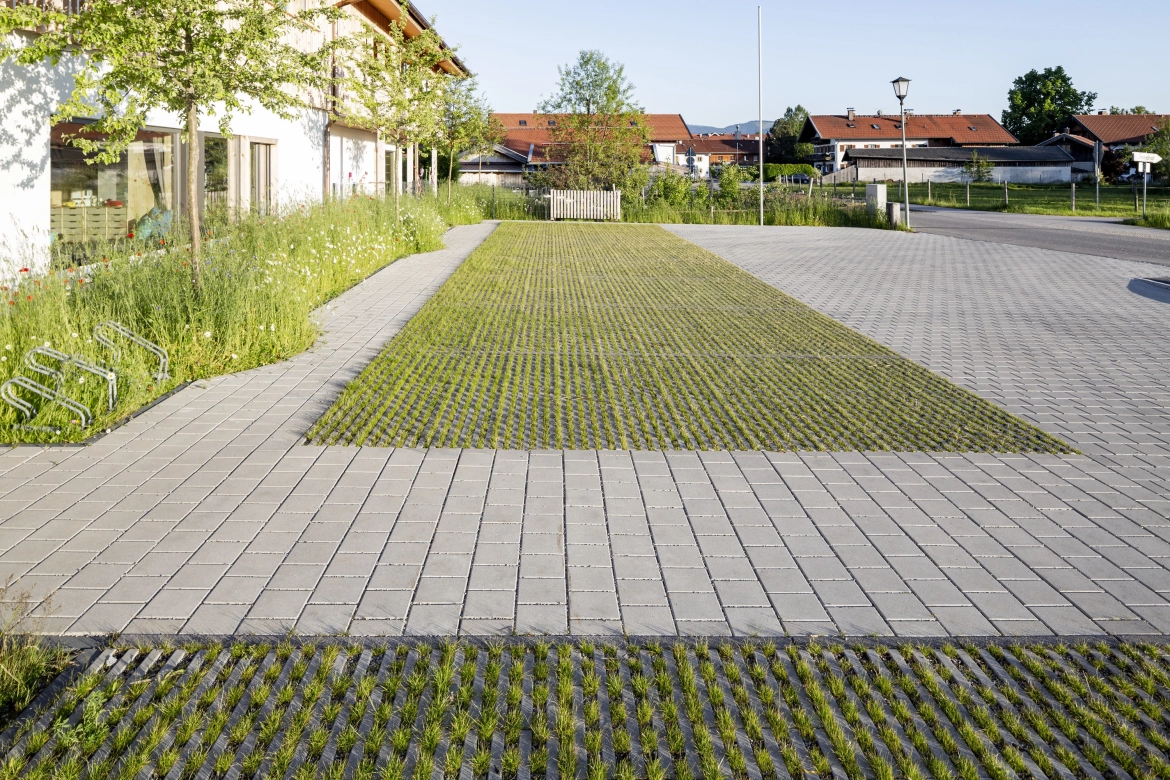 Parking lots with grass joints and paved paths