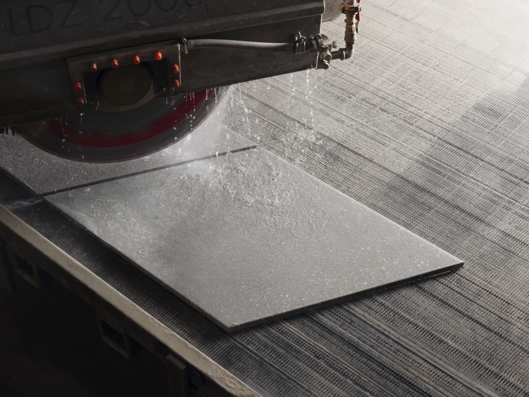 GDM.AWA tile is sawn out of a large rectangular slab.
