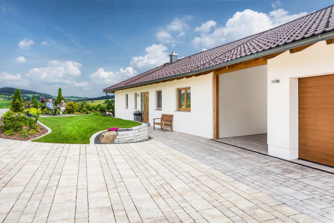 Rural house with large driveway and paving in shell limestone