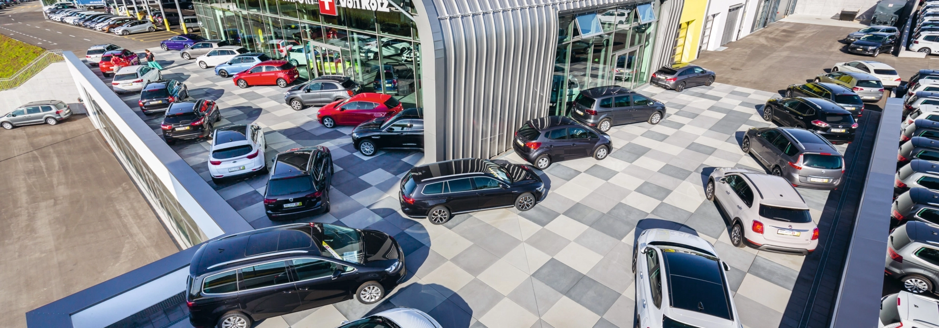car dealership parking lot modern