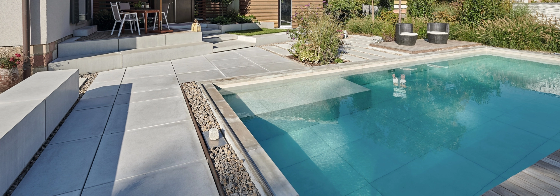 Home garden with pool and XXL patio slabs