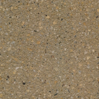 Concrete surface pattern in ochre with small gravel inclusions and blasted look