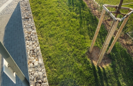 school planted parking lot wall