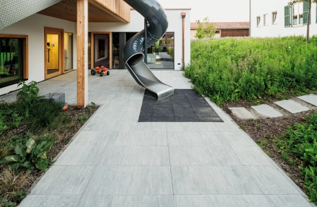 slide house planted garden