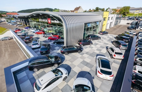 car dealership parking lot modern