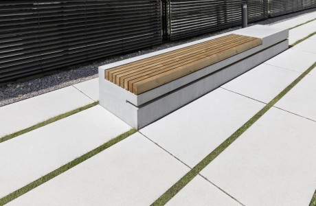 Concrete seating element with wooden support