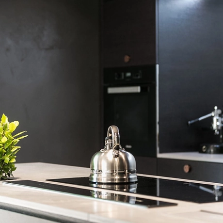 Kitchen with handmade concrete worktop
