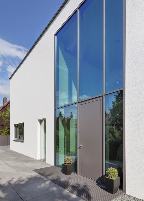courtyard entrance modern lawn glass front
