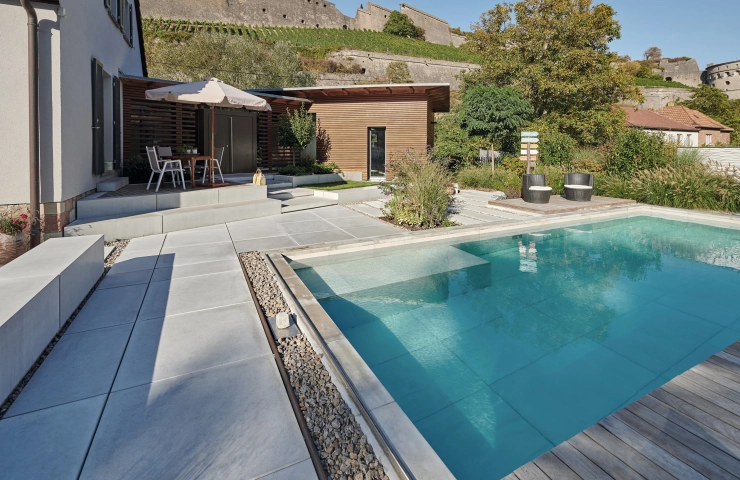 Home garden with pool and XXL patio slabs