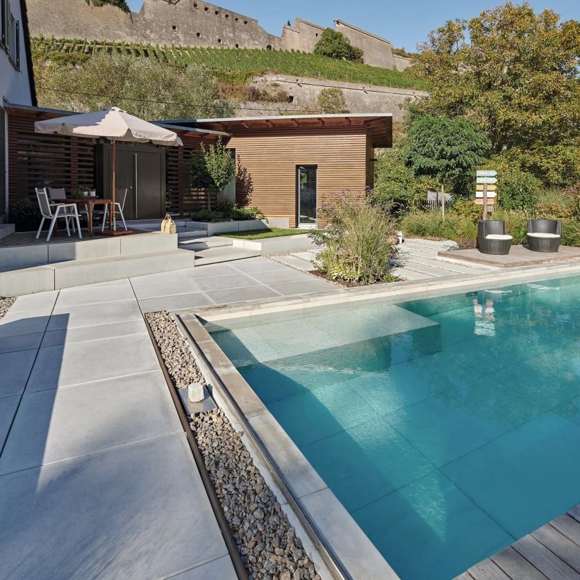 XXL patio slabs Exposed concrete slabs Pool surround
