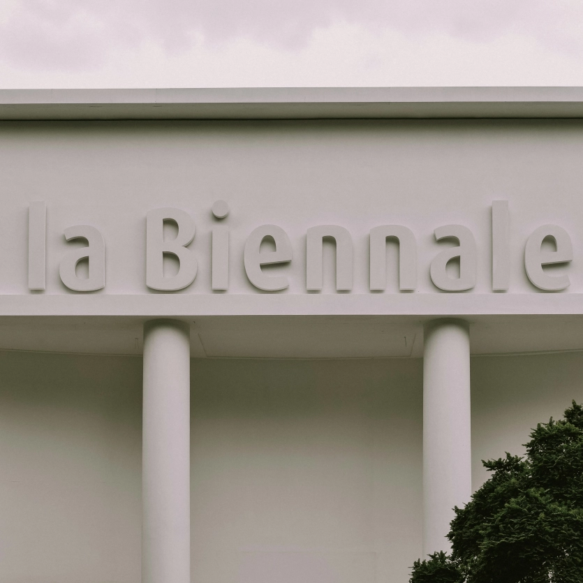 "La Biennale" step drawing on a white building, in the style of a Roman temple